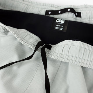 detail view of the adjustable waistband of the ciele athletics WRKShort unisex running and technical short from the Lifestyle Edition collection, in light grey color