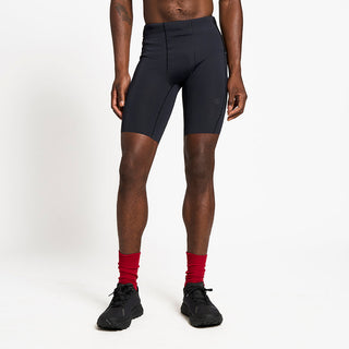 front view of the ciele athletics race ready and performance driven tights named CRGTight in shadowsphinx color, on a model